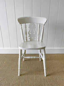 A Vintage Set of 8 Fiddleback Chairs