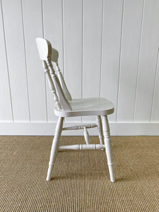 A Vintage Set of 8 Fiddleback Chairs