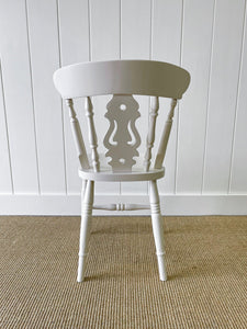 A Vintage Set of 8 Fiddleback Chairs