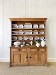 An Early 19th Century Pine Irish Dresser or Cupboard with Wooden Knobs