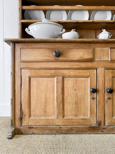 An Early 19th Century Pine Irish Dresser or Cupboard with Wooden Knobs