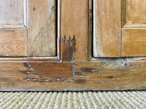 An Early 19th Century Pine Irish Dresser or Cupboard with Wooden Knobs