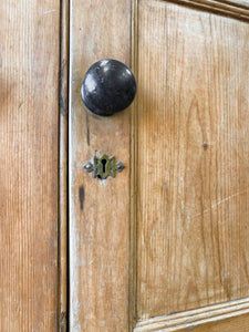 An Early 19th Century Pine Irish Dresser or Cupboard with Wooden Knobs