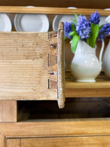 An Early 19th Century Pine Irish Dresser or Cupboard with Wooden Knobs