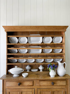 An Early 19th Century Pine Irish Dresser or Cupboard with Wooden Knobs