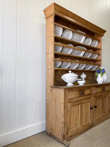 An Early 19th Century Pine Irish Dresser or Cupboard with Wooden Knobs