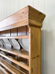 An Early 19th Century Pine Irish Dresser or Cupboard with Wooden Knobs