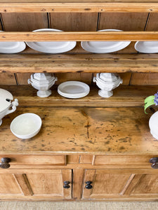 An Early 19th Century Pine Irish Dresser or Cupboard with Wooden Knobs