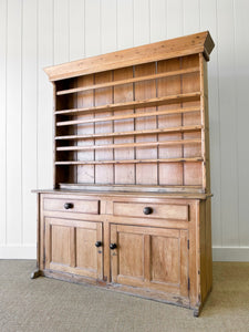 An Early 19th Century Pine Irish Dresser or Cupboard with Wooden Knobs