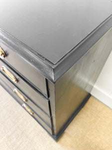 An Ebonized Antique English Chest of Drawers/Dresser