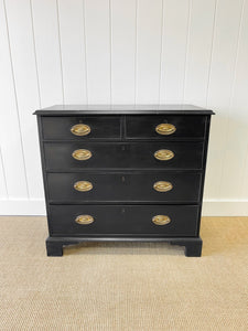 An Ebonized Antique English Chest of Drawers/Dresser