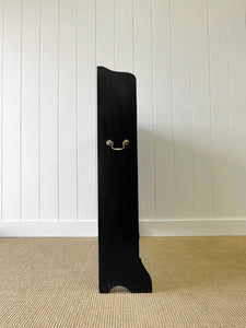 An English Ebonized Waterfall Bookcase