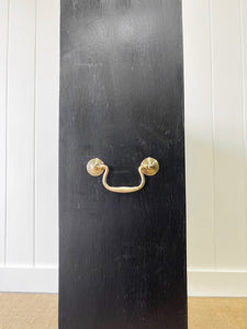 An English Ebonized Waterfall Bookcase