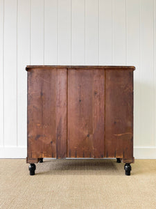 An Ebonized Antique English Chest of Drawers/Dresser with Light Knobs