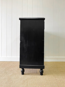 An Ebonized Antique English Chest of Drawers/Dresser with Light Knobs