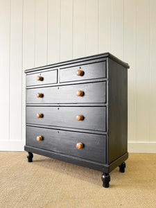 An Ebonized Antique English Chest of Drawers/Dresser with Light Knobs