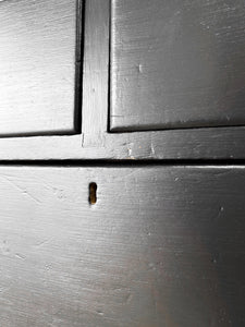 An Ebonized Antique English Chest of Drawers/Dresser with Light Knobs