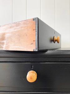 An Ebonized Antique English Chest of Drawers/Dresser with Light Knobs