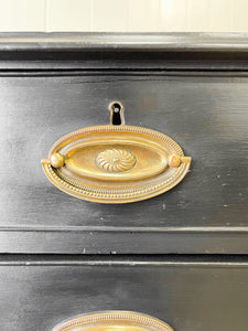 An Ebonized Antique English Chest of Drawers/Dresser