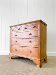 An Early 19th Century English Chest of Drawers/Dresser on Bracket Feet