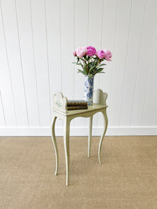A Dainty French Book End Table with Painted Daisies
