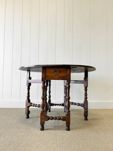 A Very Good Antique English Country Oak Drop Leaf Gate Leg Table