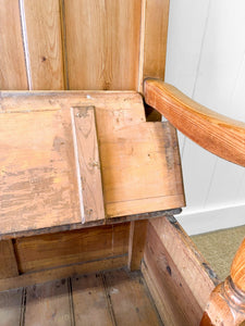 An Antique English 19th Century Pine Settle