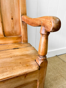 An Antique English 19th Century Pine Settle