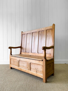 An Antique English 19th Century Pine Settle