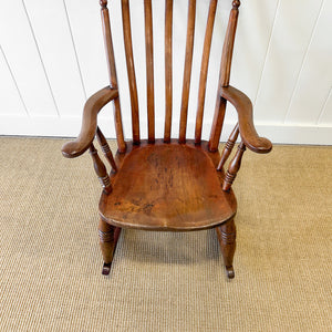 A Victorian Beech Slat Back Windsor Farmhouse Rocking Chair