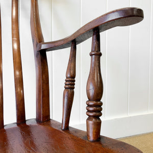 A Victorian Beech Slat Back Windsor Farmhouse Rocking Chair