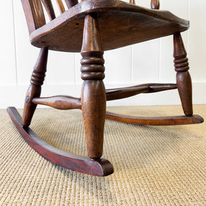 A Victorian Beech Slat Back Windsor Farmhouse Rocking Chair