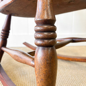 A Victorian Beech Slat Back Windsor Farmhouse Rocking Chair