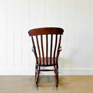 A Victorian Beech Slat Back Windsor Farmhouse Rocking Chair