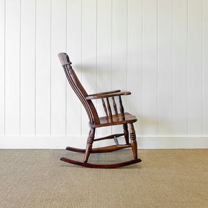 A Victorian Beech Slat Back Windsor Farmhouse Rocking Chair