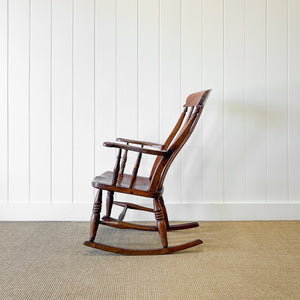 A Victorian Beech Slat Back Windsor Farmhouse Rocking Chair