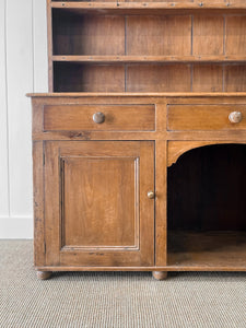 A Very Large Pine Welsh Dresser or Cupboard with Dog Kennel Center
