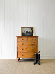 A 19th Century Bow Front English Chest of Drawers