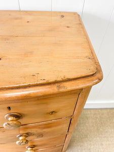 A 19th Century Bow Front English Chest of Drawers