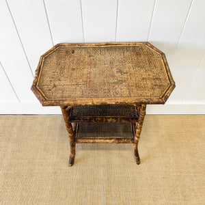 A Victorian Tortoise Shell Colored Bamboo Octagonal Three Tier Occasional Table