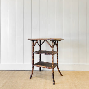 A Victorian Tortoise Shell Colored Bamboo Octagonal Three Tier Occasional Table