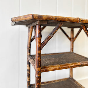 A Victorian Tortoise Shell Colored Bamboo Octagonal Three Tier Occasional Table