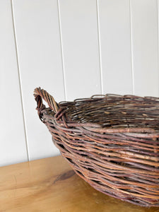 An Antique Willow Laundry Basket