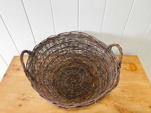 An Antique Willow Laundry Basket