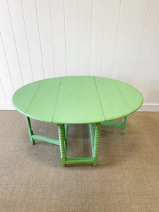 A Period English Oak Painted Country Drop Leaf Gate Leg Table