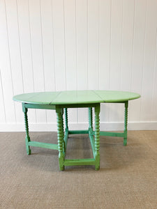 A Period English Oak Painted Country Drop Leaf Gate Leg Table