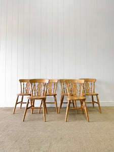 A Set of 6 Fiddleback Chairs