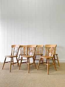 A Set of 6 Fiddleback Chairs
