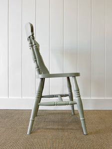 A Vintage Set of 4 Sage Green Spindle Back Chairs