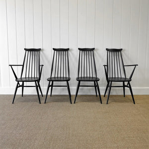 A Set of 4 Black Ercol Chairs